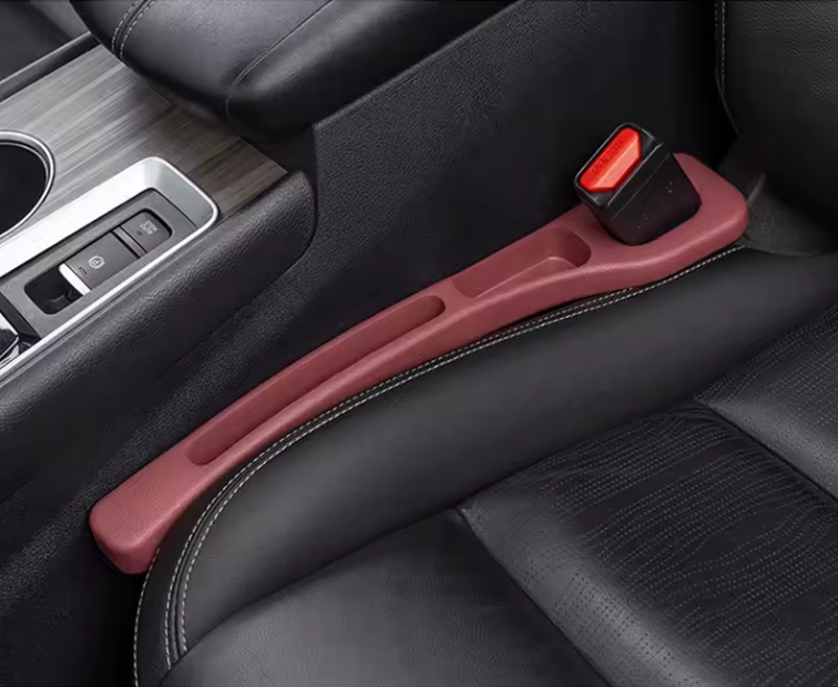 NEUŽKRIS sėdynių tarpų apsauga.