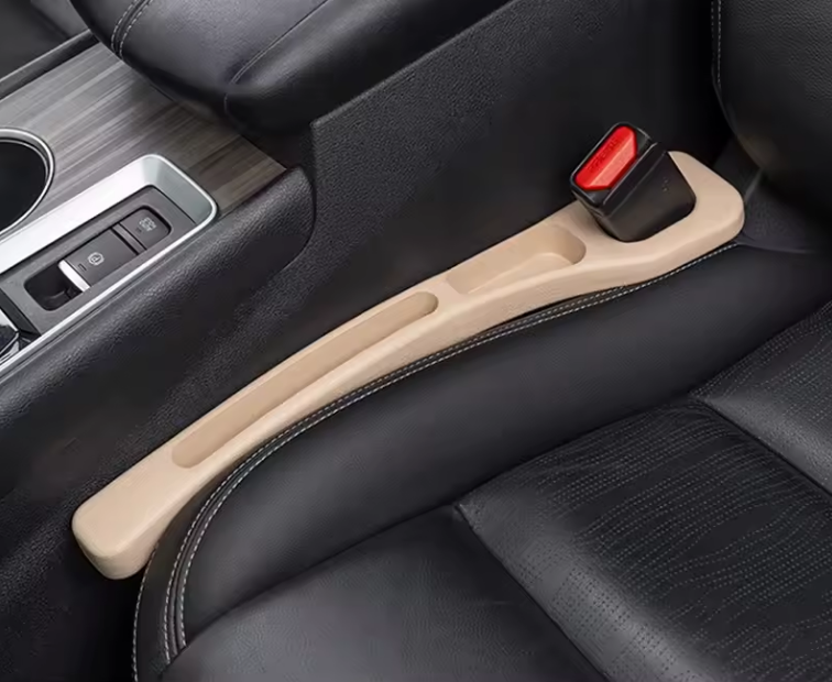 NEUŽKRIS sėdynių tarpų apsauga.