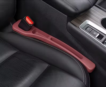 NEUŽKRIS sėdynių tarpų apsauga.