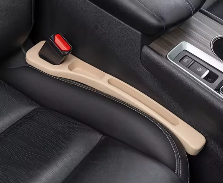 NEUŽKRIS sėdynių tarpų apsauga.