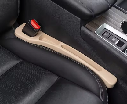 NEUŽKRIS sėdynių tarpų apsauga.